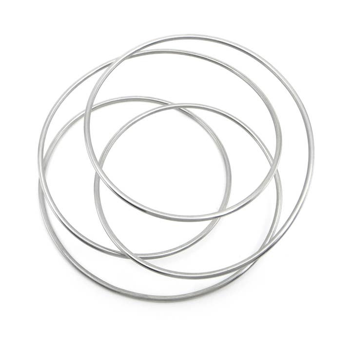 Nuclear Statement Bangle in stainless steel for wholesale by DeeLyn :: Design