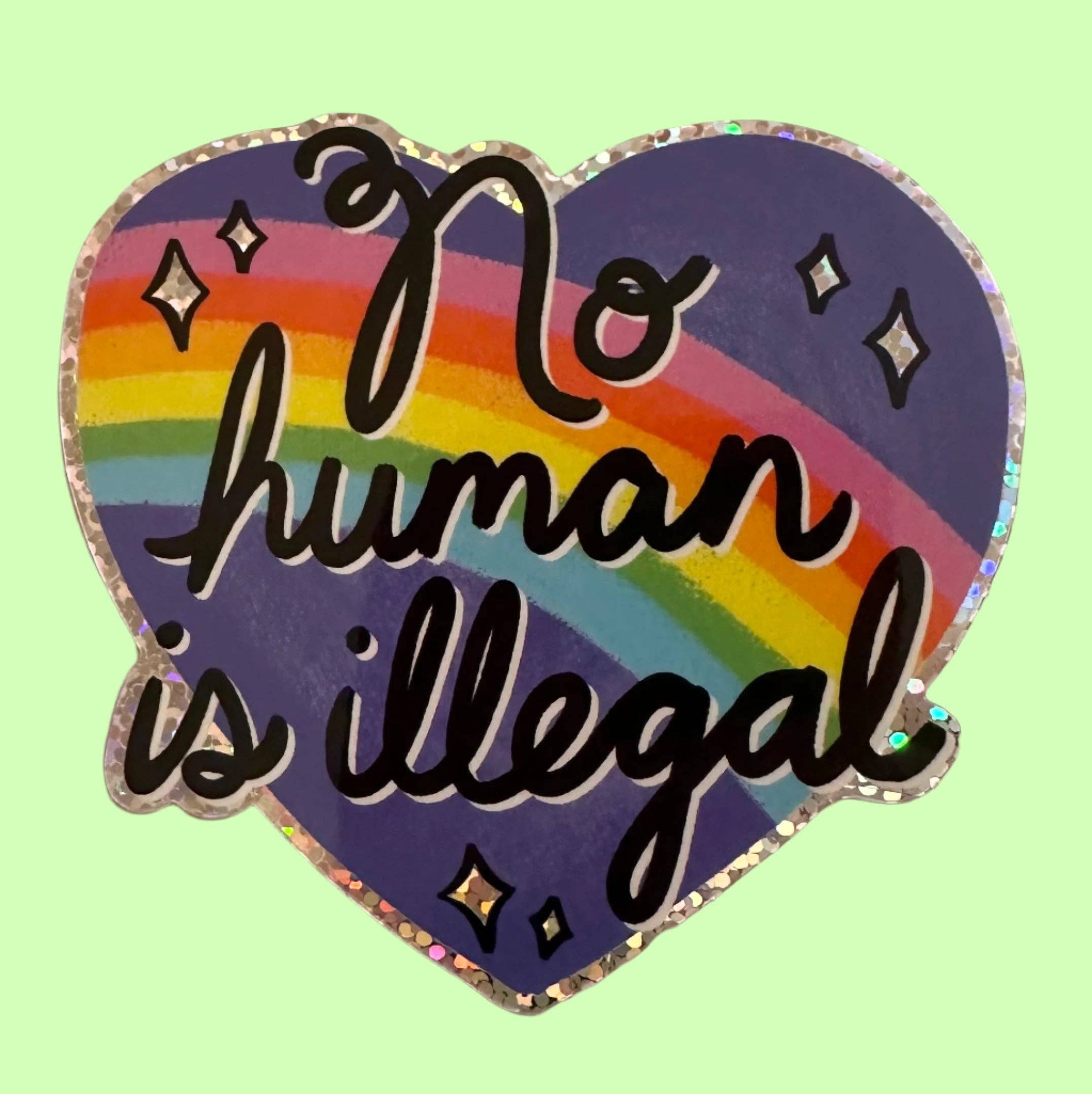 Hilarious Humanitarian - Wholesale Sticker - No Human Is Illegal Glitter Sticker1