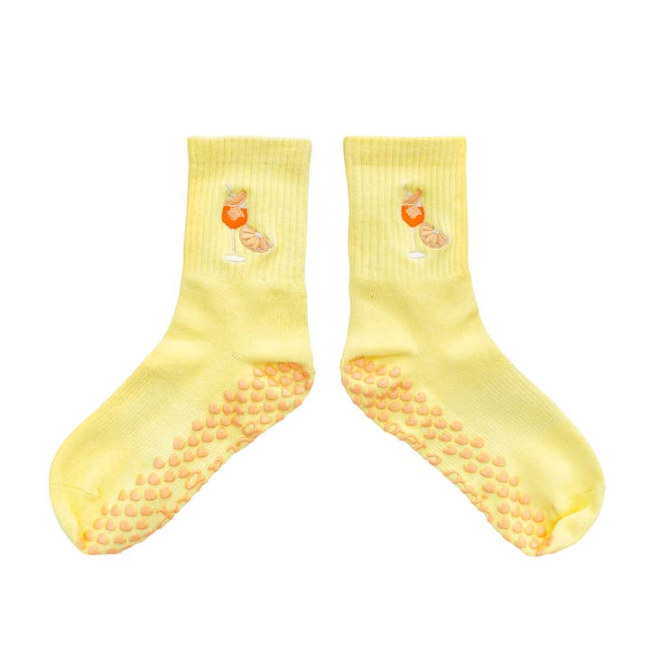 Aperol Glow Grippy Socks for wholesale by Get A Grip Socks Co