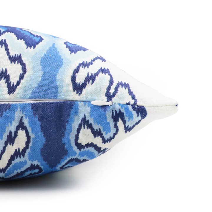 Nova Blue and White Ikat Throw Pillow for wholesale on Faire