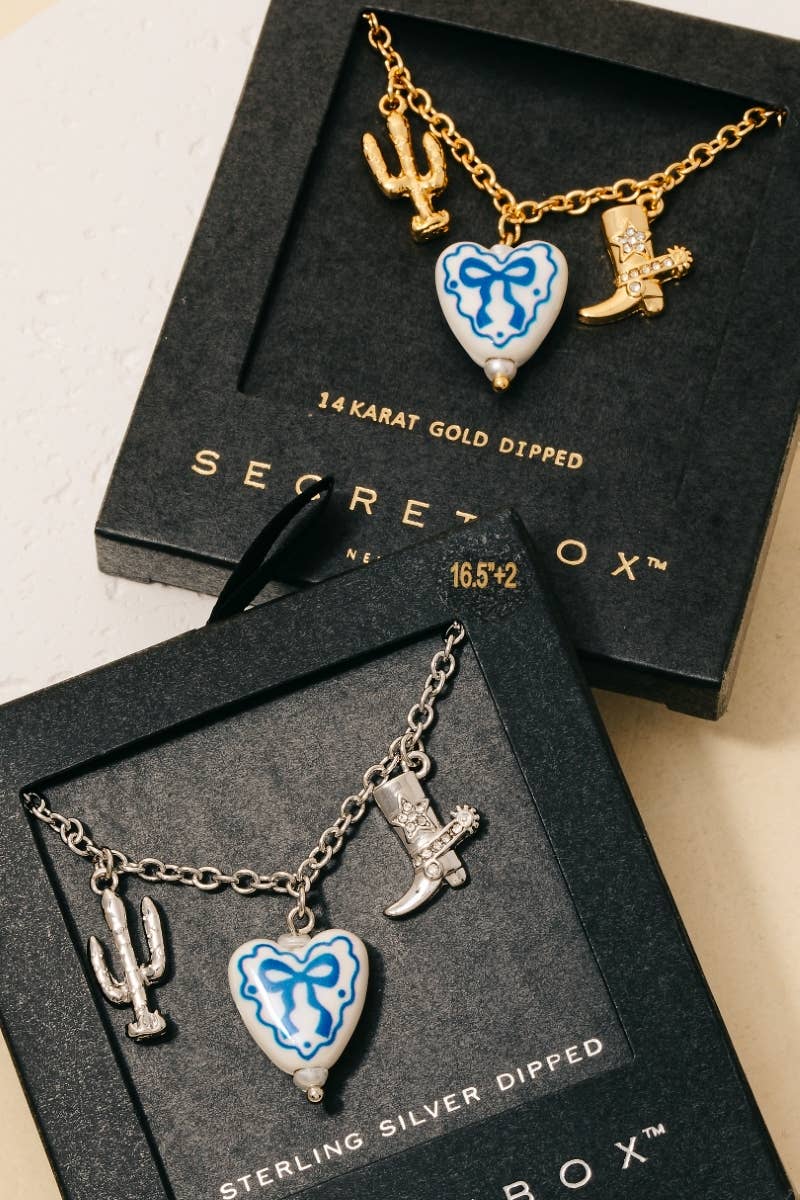 Fame Accessories – wholesale Kedjehalsband – Gulddoppad keramisk båghjärta västerländska berlocker kedjehalsband1