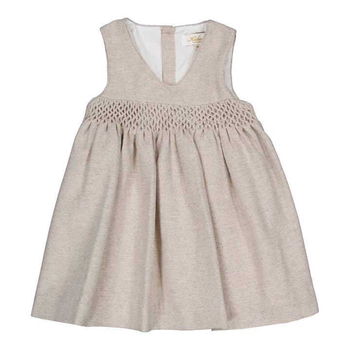 Carmelle smockkjole i uld med beige sildebenmønster for engroshandel hos Kidiwi handmade