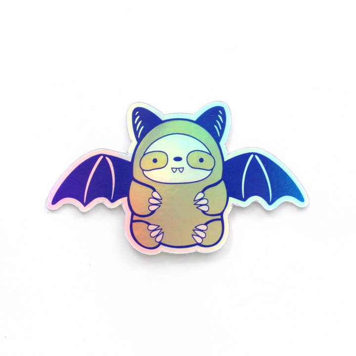 Holographic Bat Sloth Vinyl Sticker. Halloween Stationery for wholesale by Wild Whimsy Woolies
