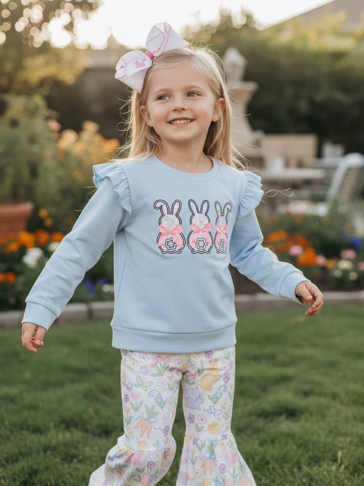 Easter bunny printed on lt.blue top & floral bell bottoms. GLP102311-JEAN for wholesale by Kids Charm Online