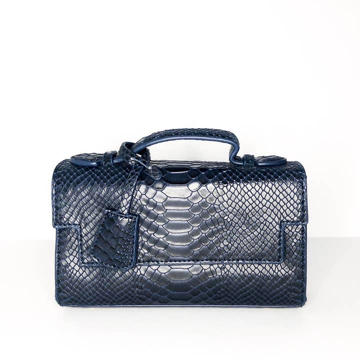 Le sac messager Philippa en bleu marine foncé pour la vente par Worth A Million