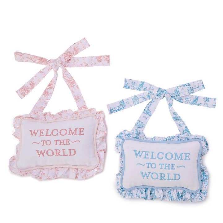 Welcome to the World Embroidered Ruffle Pillow Door Hanger for wholesale by Cupcakes & Cartwheels by Two's Company
