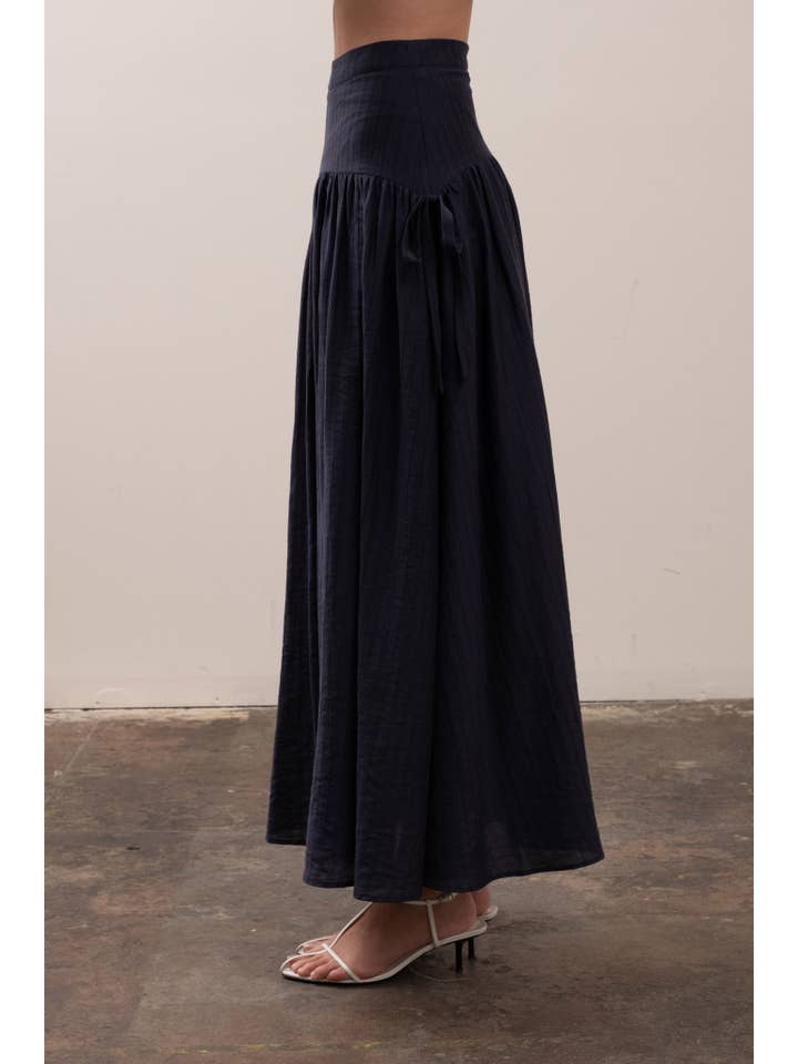 NAVY RIBBON SIDE DETAIL A-LINE MIDI SKIRT for wholesale on Faire