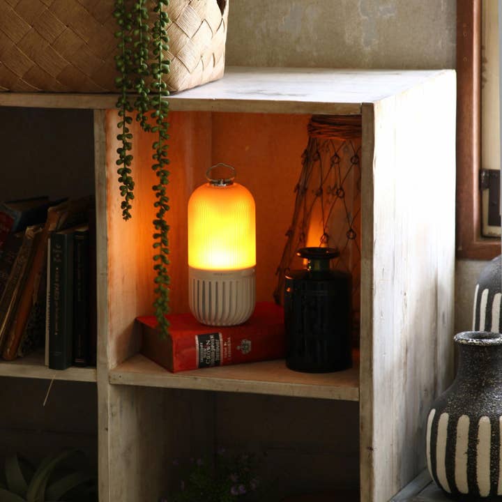 White Bonfire Bluetooth Speaker: Rechargeable & Waterproof for wholesale on Faire