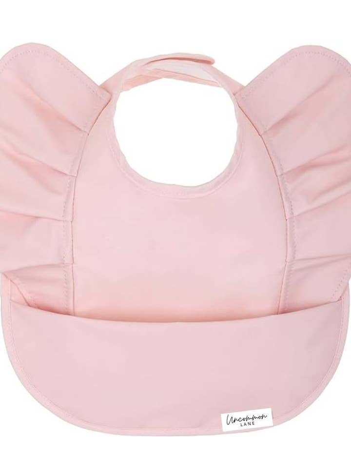 Wing Ruffle Waterproof Bib for wholesale by Uncommon Lane