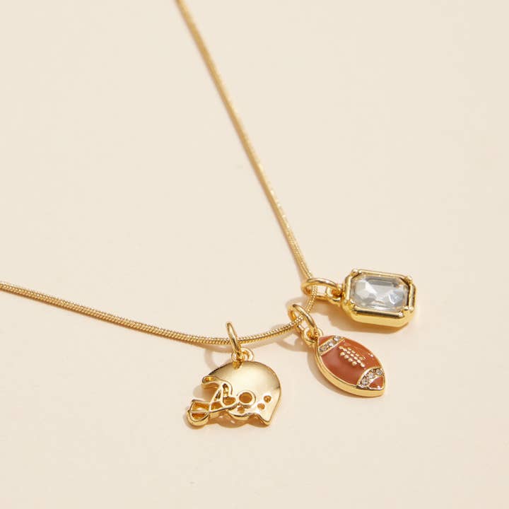18K Gold Dipped Football Helmet Charm Necklace with Gem for wholesale on Faire1