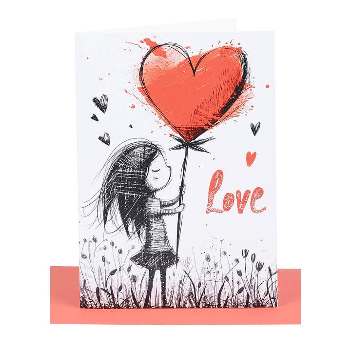 Love Card - Ragazza che tiene in mano un palloncino a forma di cuore rosso e impreziosito con glitter per la vendita all'ingrosso da parte di Lil's Cards