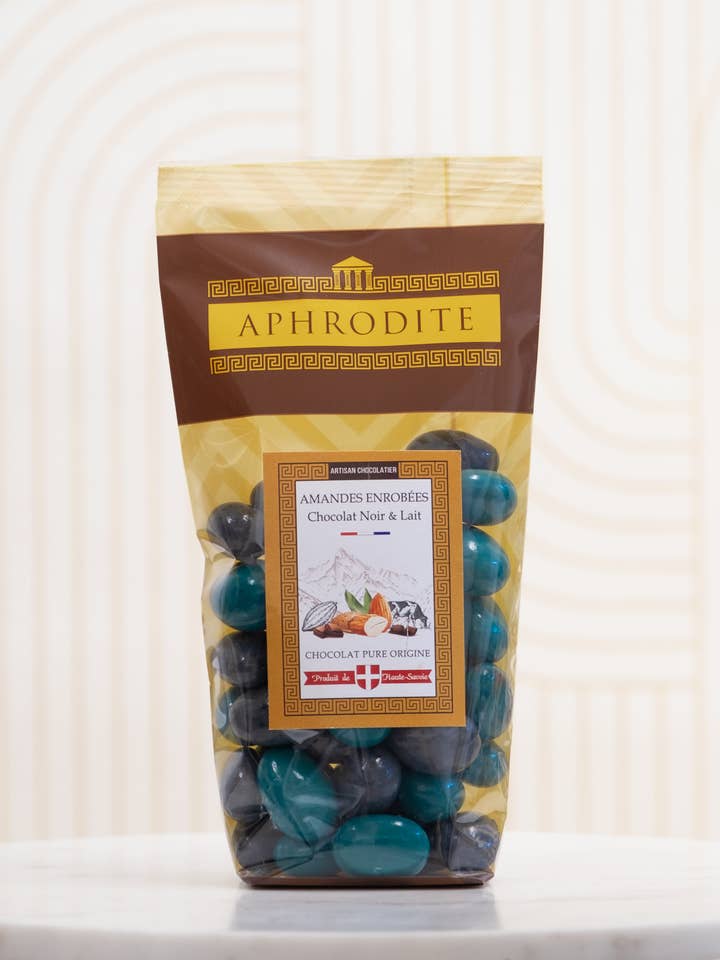 Dark chocolate-covered almond pebbles, milk for wholesale by Aphrodite