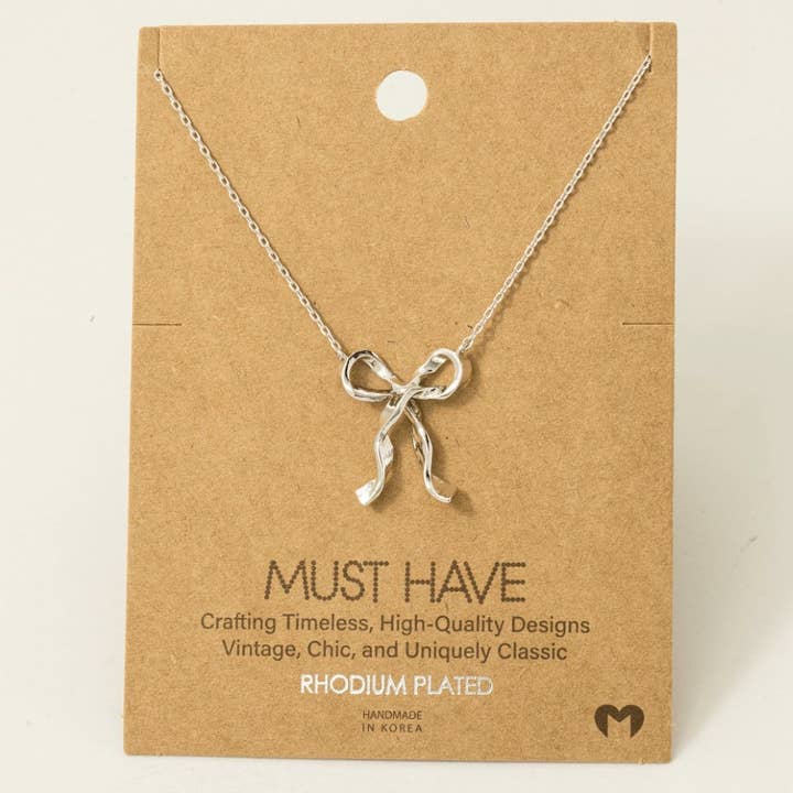 Fame Accessories - Wholesale Pendant/Charm Necklace - Gold Dipped Long Ribbon Bow Pendant Necklace
