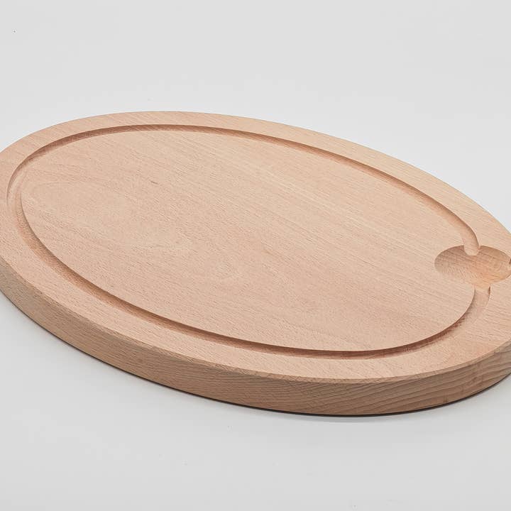 Tagliere ovale in faggio massello per la vendita all'ingrosso da parte di TOURNABOIS