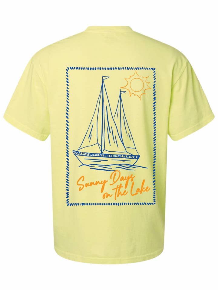 Grafisk T-shirt med solrig sødag ved søen for engroshandel hos ID Apparel