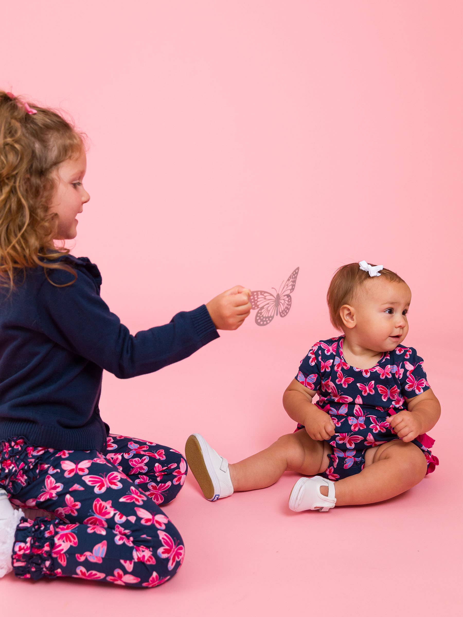 Navy Baby Girls Butterfly Bliss Knit Short Sleeve Bow Bubble Romper for wholesale on Faire7