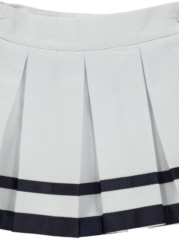 Falda blanca con estampado y cinta azul marino para venta al por mayor de Piccola Speranza