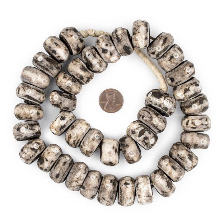 Large Carved Eye Grey Bone Beads for wholesale by The Bead Chest