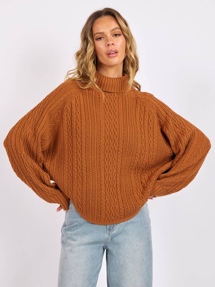 Maglione a Collo Alto in Maglia a Treccia Fable : RUGGINE per la vendita all'ingrosso da parte di Sage The Label