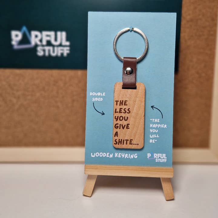 MENO TE NE FREGA UN PORTACHIAVI BIANCO per la vendita all'ingrosso da parte di Parful Stuff