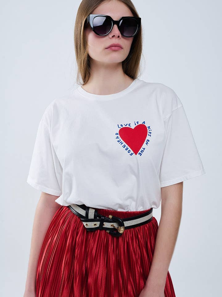 Relaxed white T-shirt featuring a heart design on both the front and back for wholesale on Faire