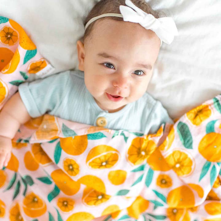 Bamboo Muslin Swaddle - Sliced Oranges for wholesale by Dolly Lana