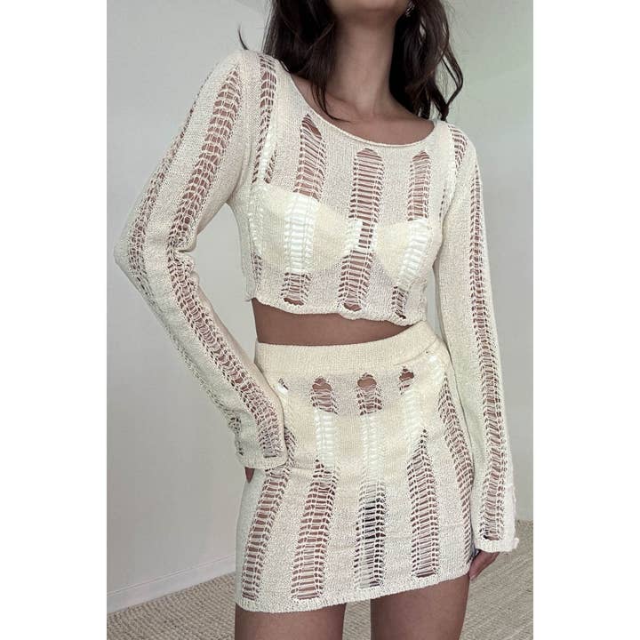 TOP DE MANGA LARGA TEJIDO EN FORMA DE ESCALERA CON MICROMINIFALDA para venta al por mayor de Salty