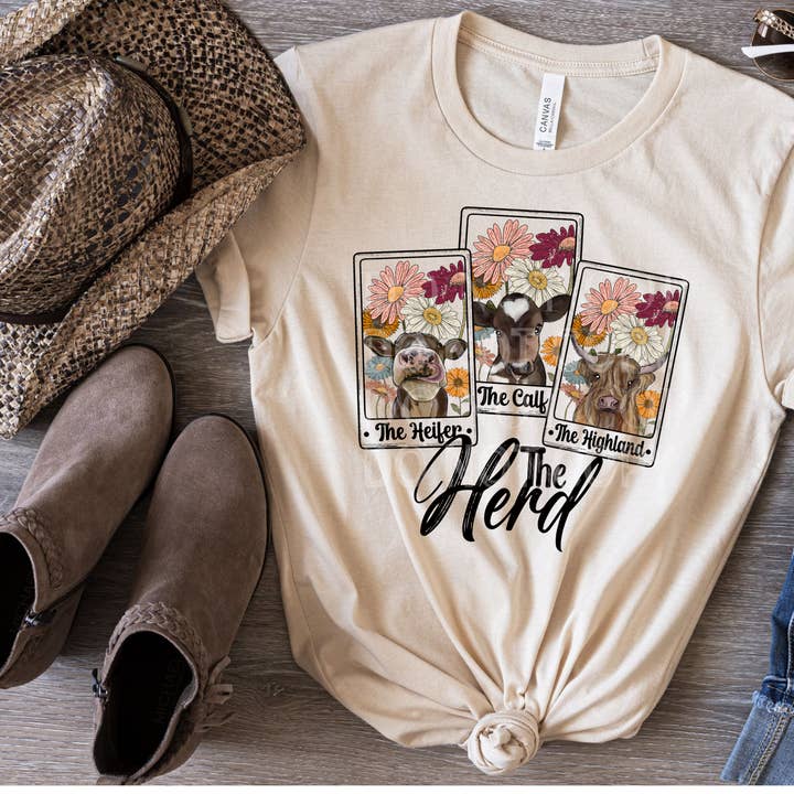 T-shirt graphique The Herd pour femme pour la vente par Cash & Drix Wholesale