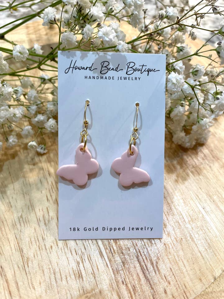 Pendentif en forme de papillon rose pour la vente par Howard Bead Boutique