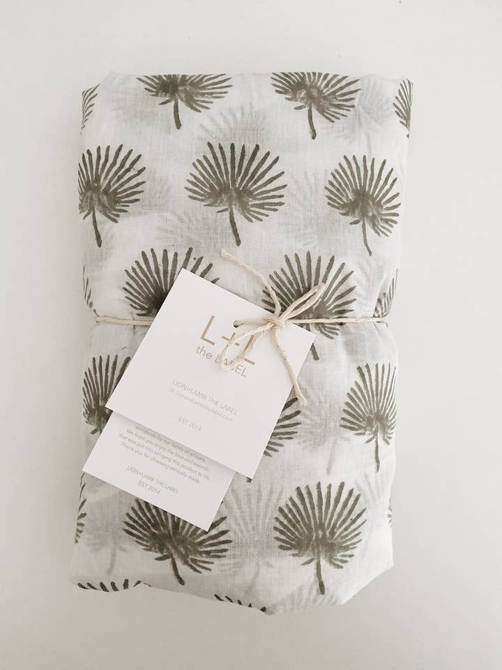 Fan Palm Fitted Cot Sheet for wholesale by Lion + Lamb the Label