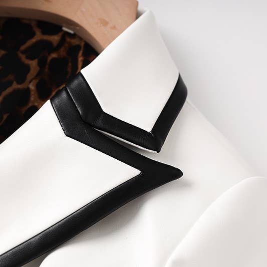 BL035 PU White Blazer: Bold Black Trim & Wild Lining for wholesale on Faire