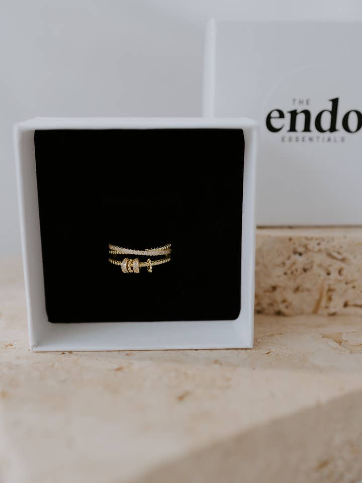 Gold Sliding Anxiety Fidget Ring for wholesale by The Endo Essentials