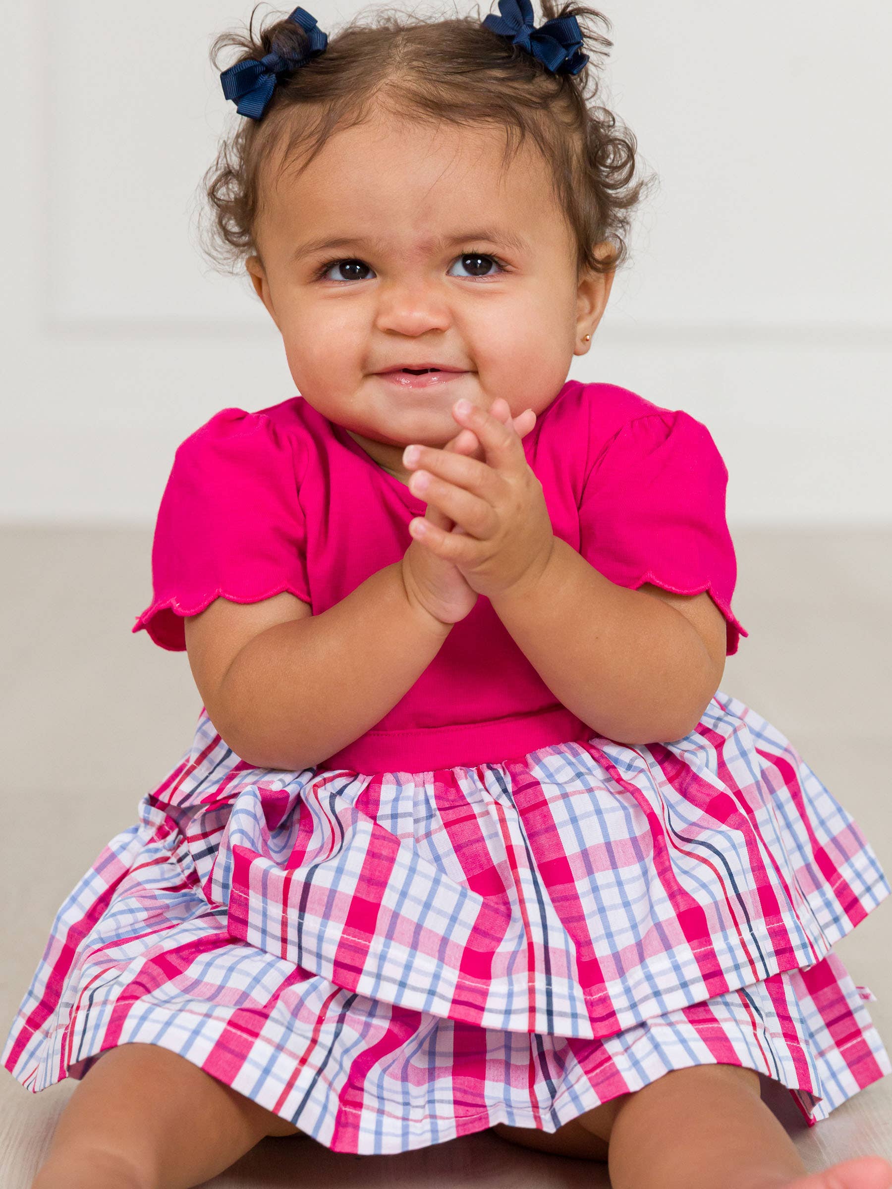 Pink Baby Girls Adley Plaid Short Sleeve Skirted Romper for wholesale on Faire0