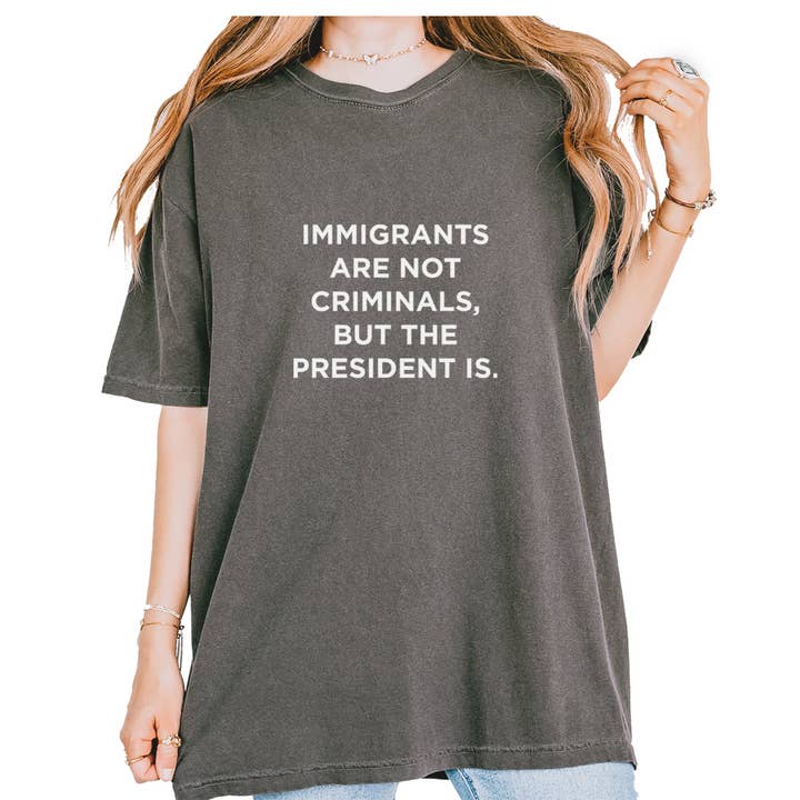 Immigrants Are Not Criminals Vintage Soft Unisex T-shirt for wholesale by Expression Tees