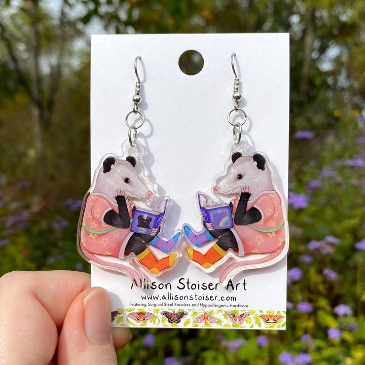 Acrylic Reading Opossum Earrings for wholesale by Allison Stoiser Art