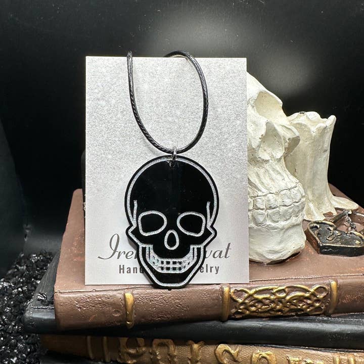 Gothic Metallic Silver & Black Skull Acrylic Pendant on 18" Silk Cord for wholesale by Irena Blavat Designs