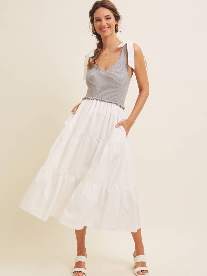 ABITO MIDI A BALZE IN MAGLIA A COSTE E TESSUTI MISTI per la vendita all'ingrosso da parte di in february