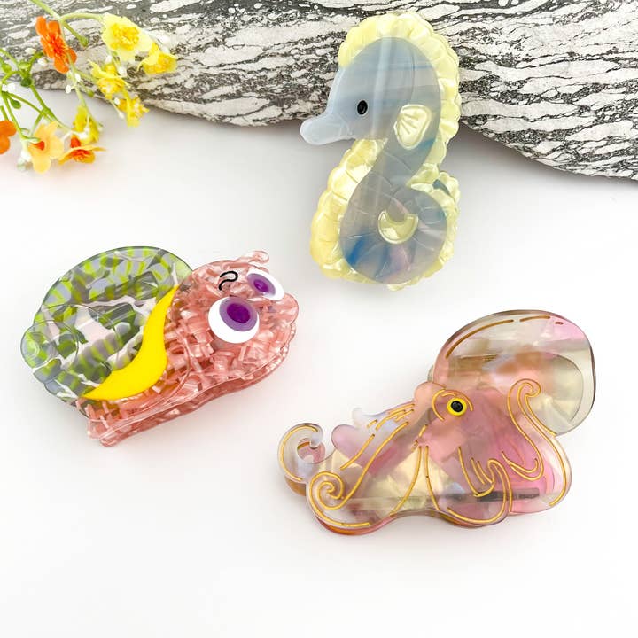 Söt tecknad havsdjurs hÄrklÀmma i acetat för wholesale av mildstyles