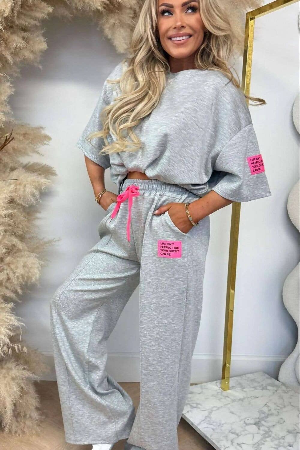 J5FASHION - Wholesale Lounge Set - Women's - GRAPHIC BADGE BAGGY T-SHIRT WITH WIDE LEG TROUSER2