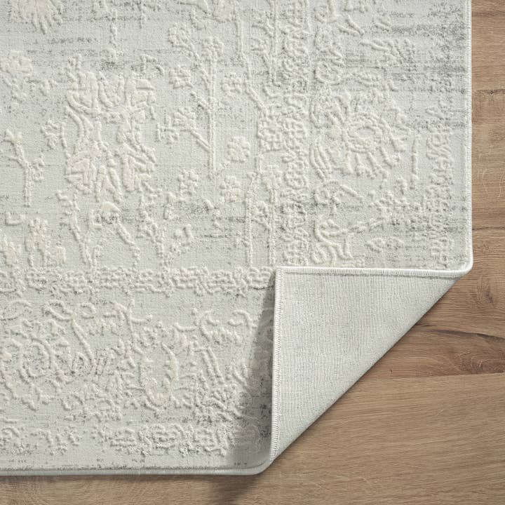 Ivory Gray Distressed Hi-Low Traditional Botanical Area Rug for wholesale on Faire
