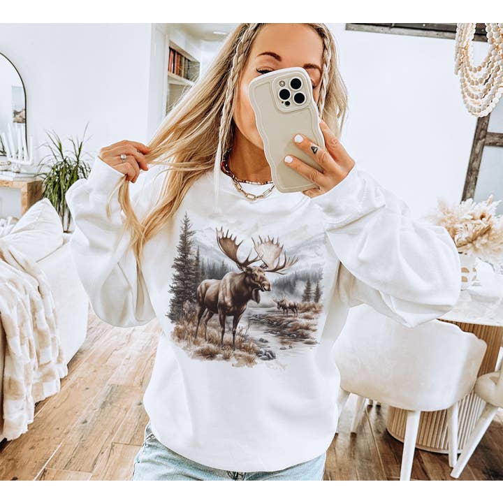 NVC Ecommerce LLC - Wholesale T-Shirt (Graphic) - Women's - Retro Bull Moose Wilderness Scene Tee, Winter Sweater1