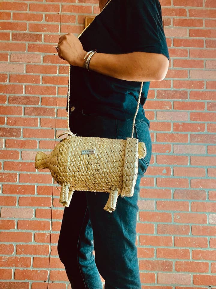 Straw piggy bag / palm leaf pig bag for wholesale by The Faria