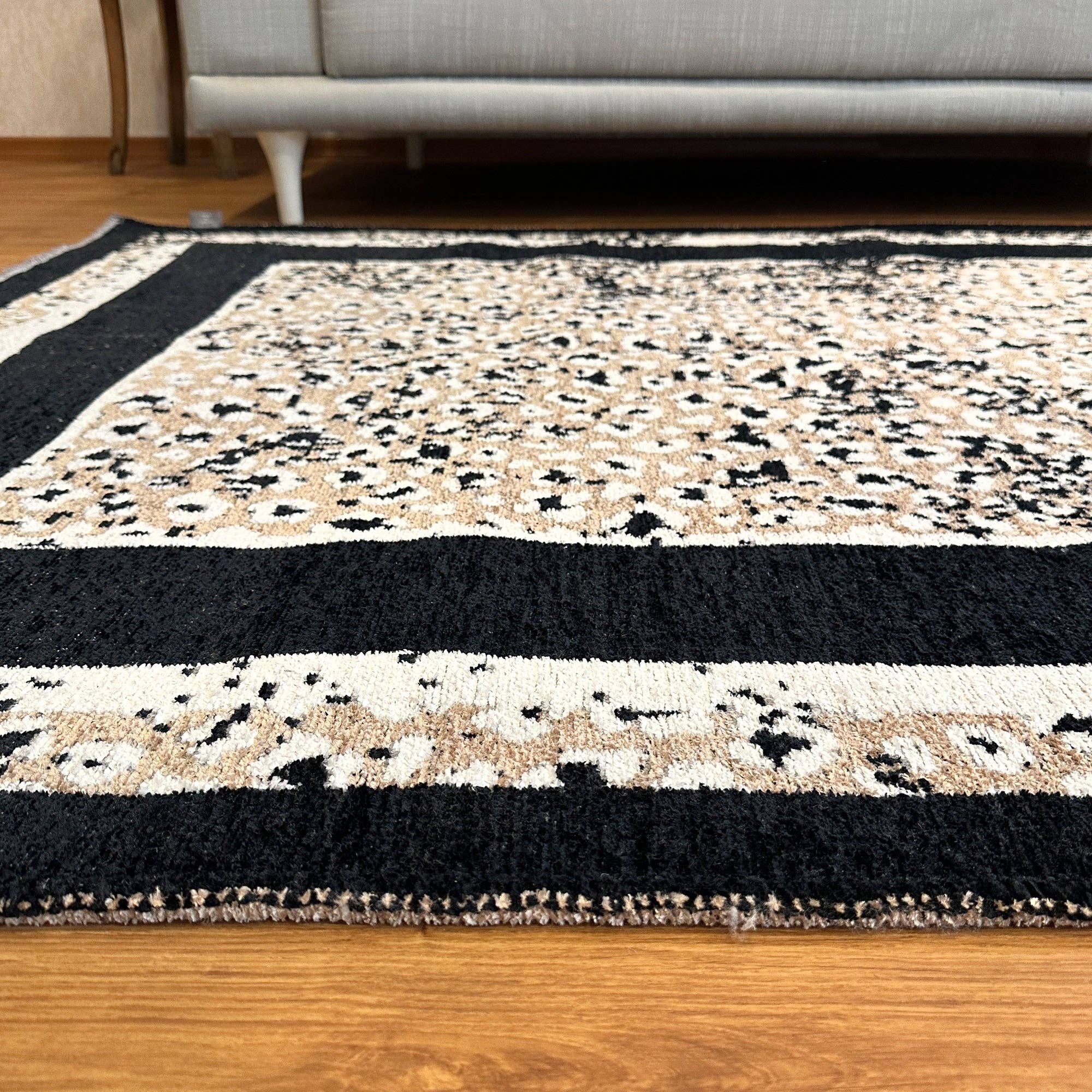 Reversible Leopard Black Beige Washable Area Rugs for wholesale on Faire4