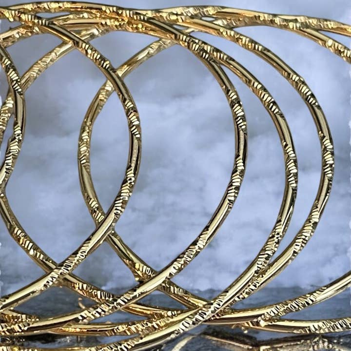 Divina Jewelry & Accessories LLC - Venta al por mayor Juegos de joyas - Pulseras de Brazalete Electrochapadas en Oro de 14k Semanario de 7 Días2