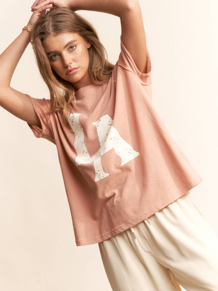 dust blush LA Logo Print Casual Short Sleeve Top for wholesale on Faire