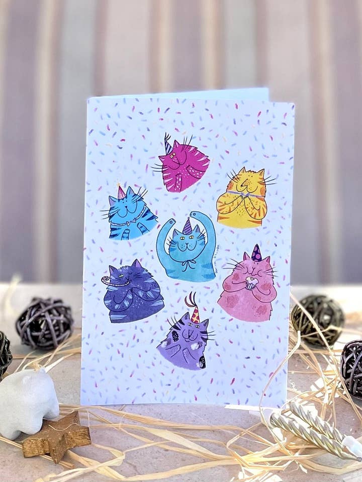 Cats in birthday hats and confetti: Greeting card for wholesale by Dariia Dziuba