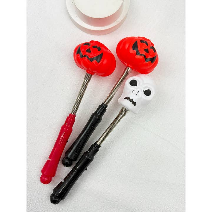 MIX COLOR Glowing Pumpkin Skull Shaking Stick for wholesale on Faire4