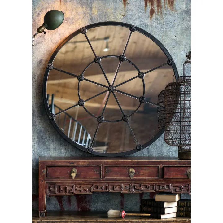 Distressed Round Cast Iron Mirror with Rosettes for wholesale by Vagabond Vintage