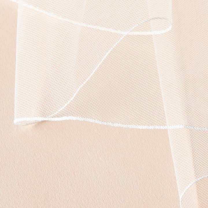 Ivory 2 Layer Pencil Edge Veil for wholesale on Faire
