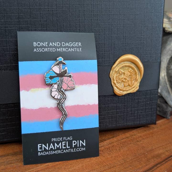 Trans Pride Sword Enamel Pin for wholesale by Bone and Dagger Assorted Mercantile